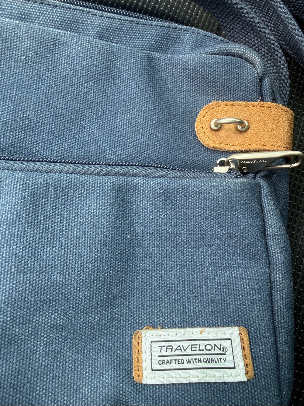 Travelon Navy Blue Canvas Messenger Bag with Tan Accents - Picture 2 of 12